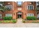 Charming red brick building with well-maintained landscaping and a welcoming entrance at 5730 Closeburn Rd # H, Charlotte, NC 28210