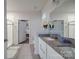Spacious bathroom featuring granite counters, a large mirror, and glass enclosed shower at 5918 Barrowlands Ct, Charlotte, NC 28210