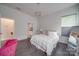 Inviting bedroom with a cozy bed, ensuite bathroom, and ample natural light at 5918 Barrowlands Ct, Charlotte, NC 28210