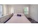 Bright bedroom with luxury finishes, built-in cabinets, and a plush, comfortable bed at 5918 Barrowlands Ct, Charlotte, NC 28210