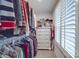 Well-organized closet with custom shelves and hanging space, maximizing storage with built-in drawers and shelving at 5918 Barrowlands Ct, Charlotte, NC 28210