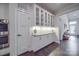 Elegant dining room featuring custom cabinets with glass doors, granite counters, and hardwood floors at 5918 Barrowlands Ct, Charlotte, NC 28210