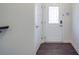 Inviting entryway featuring a stylish front door with glass paneling and dark wood floors at 5918 Barrowlands Ct, Charlotte, NC 28210