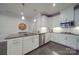 Modern kitchen with white cabinets, granite countertops, stainless steel appliances, and a subway tile backsplash at 5918 Barrowlands Ct, Charlotte, NC 28210