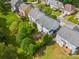 Aerial view of a property with a backyard featuring a cozy fire pit and an upper-level deck at 6424 Chadwell Ct, Fort Mill, SC 29707
