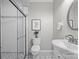 Updated bathroom featuring a glass enclosed shower and stylish tile floors at 6424 Chadwell Ct, Fort Mill, SC 29707