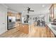 Bright kitchen overlooks a dining area and living room with a fireplace at 6424 Chadwell Ct, Fort Mill, SC 29707