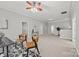 Spacious living area featuring neutral paint, a ceiling fan, and open design at 6424 Chadwell Ct, Fort Mill, SC 29707