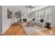 Cozy living room with a fireplace, built-in bookshelves and plush furnishings at 6424 Chadwell Ct, Fort Mill, SC 29707