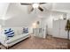 Bonus room features pitched ceilings, a sofa, carpeted floor, and ample natural light at 6990 Ridgeway Rd, Stanley, NC 28164