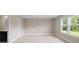 Bedroom with neutral paint, carpet, and windows allowing for lots of natural light at 709 Cavesson Way, Monroe, NC 28110