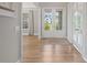 Welcoming foyer with hardwood floors, double front doors, and ample natural light at 709 Cavesson Way, Monroe, NC 28110