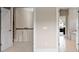 Hallway showing access to multiple rooms with neutral walls and carpeted floors at 709 Cavesson Way, Monroe, NC 28110