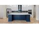 Kitchen island with seating space, quartz countertops, and stainless steel appliances at 709 Cavesson Way, Monroe, NC 28110