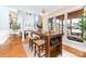 Open-concept dining area with modern pendant lighting and scenic water views at 7220 Swansea Ln, Cornelius, NC 28031
