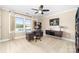 Inviting home office with lake view, neutral walls and carpet at 7220 Swansea Ln, Cornelius, NC 28031
