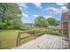 Spacious backyard with wooden deck at 813 S Ridge Ave, Kannapolis, NC 28083