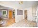 Open dining area with tile floors and chandelier at 813 S Ridge Ave, Kannapolis, NC 28083