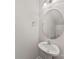 Clean half bathroom with a modern sink, mirror, and fixtures at 8505 Loxton Cir, Charlotte, NC 28214