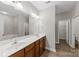 Bathroom boasts double sink vanity and bathtub at 8505 Loxton Cir, Charlotte, NC 28214