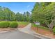 The Vineyards community entrance with lush green space and a playground area at 8505 Loxton Cir, Charlotte, NC 28214