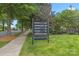 A community sign highlights neighborhood amenities such as the boat ramp, docks and lake picnic area at 8505 Loxton Cir, Charlotte, NC 28214