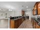 Spacious kitchen with granite countertops, stainless steel appliances, and wood cabinetry at 8505 Loxton Cir, Charlotte, NC 28214