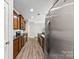 Kitchen featuring stainless steel appliances, wooden cabinets, and granite countertops at 8505 Loxton Cir, Charlotte, NC 28214