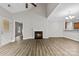 Bright living room features a cozy fireplace and an open floor plan perfect for entertaining at 8505 Loxton Cir, Charlotte, NC 28214