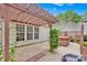 Outdoor space featuring a pergola and a hot tub, perfect for relaxation and entertaining at 8938 Kestral Ridge Dr, Charlotte, NC 28269