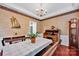 Formal dining room featuring vintage touches with wainscoting, wallpaper and chandelier at 8938 Kestral Ridge Dr, Charlotte, NC 28269
