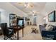 Expansive bonus room with multiple ceiling fans and a desk, providing a perfect spot for relaxation and work at 9238 Deer Spring Ln, Charlotte, NC 28210