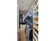 Walk in closet with lots of shelving and plenty of storage at 9238 Deer Spring Ln, Charlotte, NC 28210