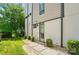 Private backyard featuring a lush lawn, stepping stone pathway, and low-maintenance landscaping at 945 Westbrook Dr # A, Charlotte, NC 28202