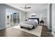 Bright bedroom with ample natural light and a stylish ceiling fan at 945 Westbrook Dr # A, Charlotte, NC 28202