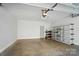 Clean, well-lit garage space with shelving and ample room for storage or parking at 945 Westbrook Dr # A, Charlotte, NC 28202