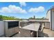 Rooftop deck with an outdoor kitchen including a grill, counter space, and storage at 945 Westbrook Dr # A, Charlotte, NC 28202