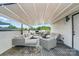 A covered rooftop deck features modern outdoor seating and a grill area, perfect for entertaining and city views at 945 Westbrook Dr # A, Charlotte, NC 28202