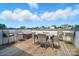 Rooftop deck with a dining table and bar stools and a view of the city at 945 Westbrook Dr # A, Charlotte, NC 28202