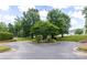 This community space offers a playground and basketball court surrounded by mature trees at 9532 Cadman Ct, Cornelius, NC 28031