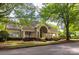 Charming single-story home with covered porch and well-manicured landscaping at 9532 Cadman Ct, Cornelius, NC 28031