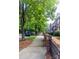 Quiet neighborhood street lined with sidewalks, manicured lawns, and mature trees at 9532 Cadman Ct, Cornelius, NC 28031