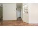 Bright living room boasts wood floors, flowing into adjacent spaces, perfect for gatherings at 10016 Lawing School Rd, Charlotte, NC 28214