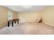 Large recreation room features a foosball table and a comfortable chair at 10016 Lawing School Rd, Charlotte, NC 28214