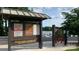 South Point Access Area showing information board with lake access rules and a boat launch in the background at 1010 Nutall Oak Ln, Belmont, NC 28012