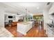Open-concept kitchen flows into the living and dining areas with great natural light at 1010 Nutall Oak Ln, Belmont, NC 28012
