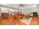 Open living area with modern furnishings and a seamless transition to the kitchen at 1010 Nutall Oak Ln, Belmont, NC 28012