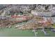 An aerial view showing amenities including a clubhouse, pool, and nearby retail on the Catawba River at 104 Steamboat Dr, Mount Holly, NC 28120