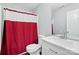 Bathroom with white marble vanity and a shower and tub combo at 10431 Plantain Ct, Charlotte, NC 28213