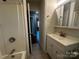 Neutral bathroom with white vanity and shower-tub combination at 1119 Sanders St, Rock Hill, SC 29732